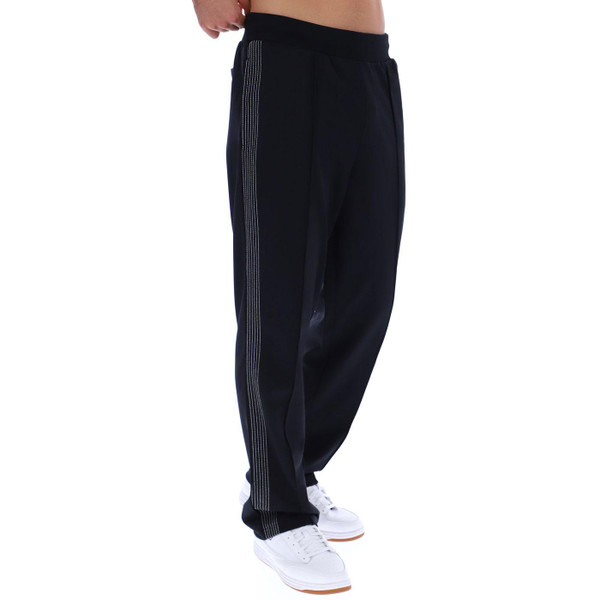 Fila Vintage Tavis Retro Stripe Tracksuit Jogging Bottoms in Black and Gardenia front view from side
