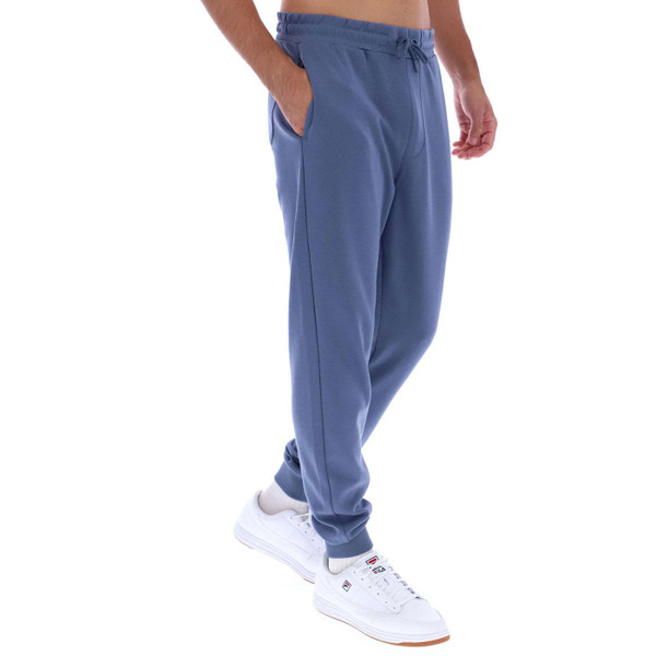 Fila Vintage Lonny Retro 80s Jogging Bottoms in Indigo Pictured from side