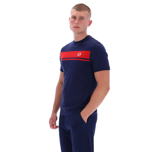 Picture of model wearing the Sergio Tacchini Master Retro 80s Chest Stripe T-shirt in Maritime Blue with hands in pockets