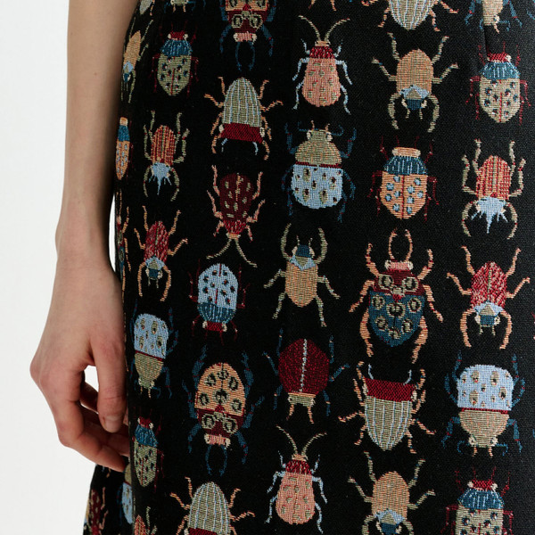 Fabric detailing on Louche London Buffy Beetlejuice A-Line Midi Skirt in Black