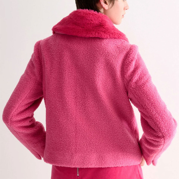 Back view of Louche London Womens Apple Borg Short Jacket with Faux Fur collar in Hot Pink 60008