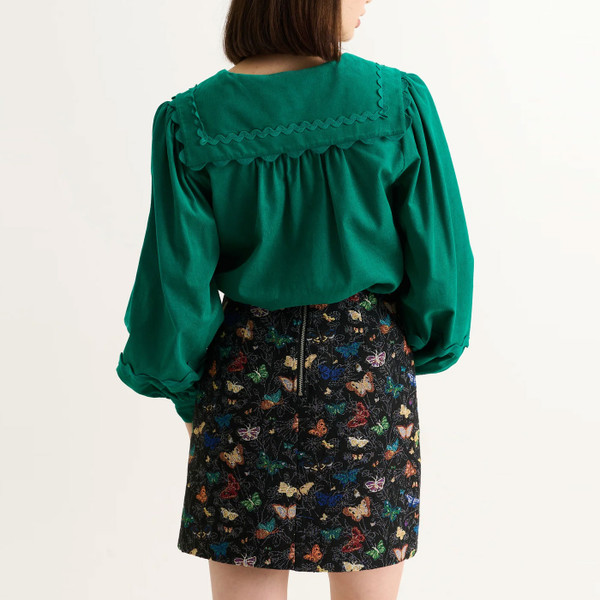 Back of Louche London Aubin Butterfly Ball Mini A-Line Skirt in Black 60018