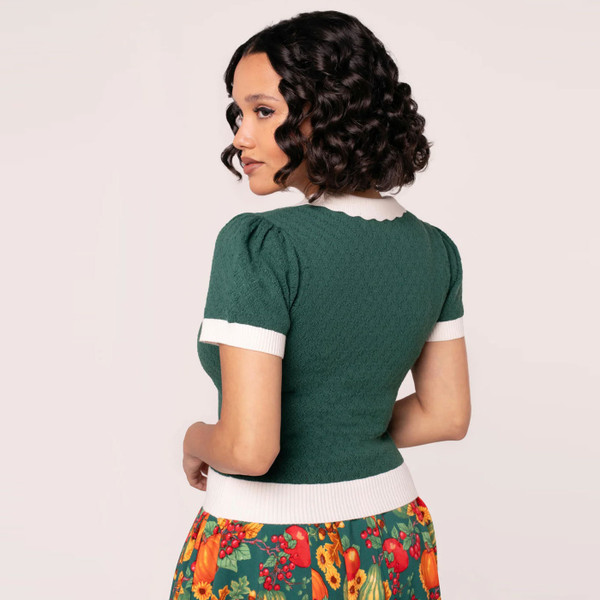 Back of model wearing Hell Bunny Genevieve Retro Autumn Toadstool Collar Top in Green