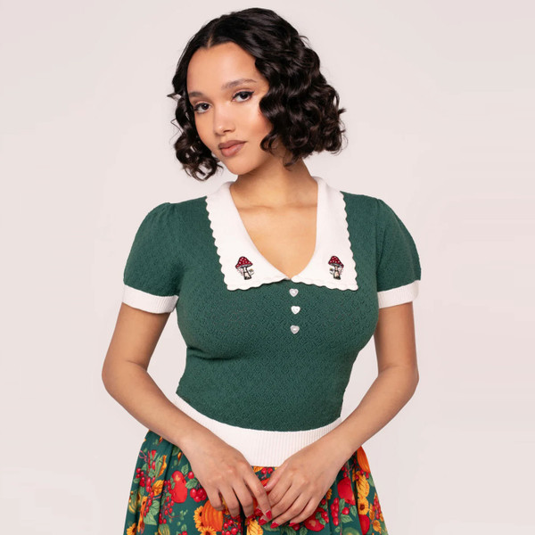 Model wears Hell Bunny Genevieve Retro Autumn Toadstool Collar Top in Green