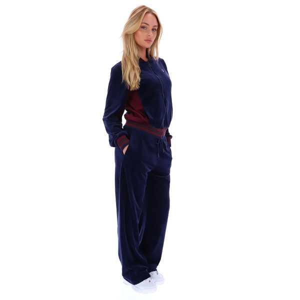 Women wearing full tracksuit for Fila Vintage Women's Jenesis Velour Track Top in Navy/Fig SS25WC016 410