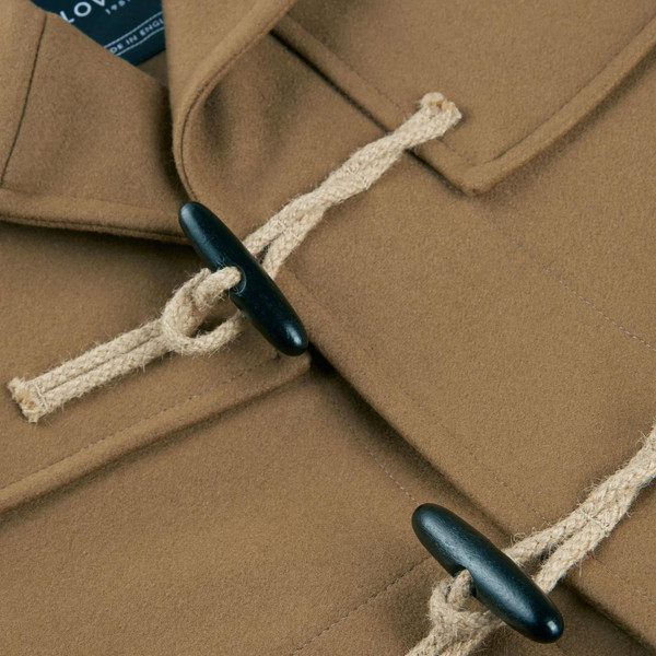Gloverall Cocteau Shawl Collar Short Duffle Coat in Camel Made in England Close up of jute rope and toggle fasteners