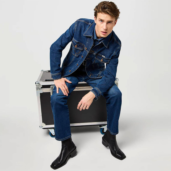 Wrangler Men's Mod Regular Classic Denim Jacket in Meadow Haze Lifestyle Image full length model shot