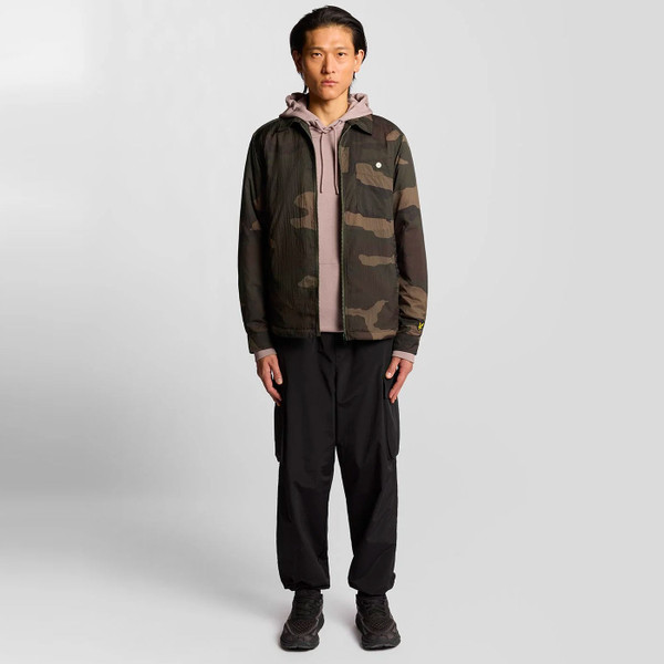 Model wearing Lyle & Scott Mens Camouflage Insulated Zip Overshirt in Grey Taupe