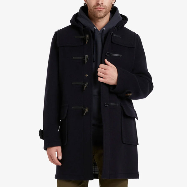 Man wearing Gloverall Morris Men's Retro Duffle Coat in Navy with Dress Gordon Check