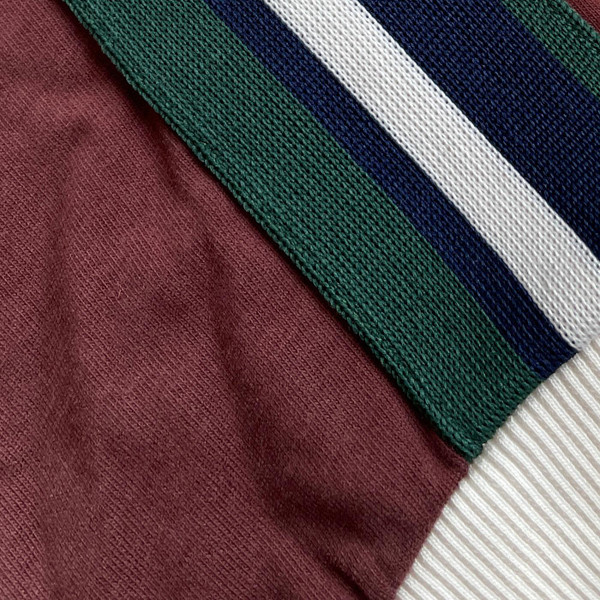 Sergio Tacchini Hadow Colour Block Taped Sleeve Ringer T-shirt in Pumpkin Spice close up on sleeve stripes