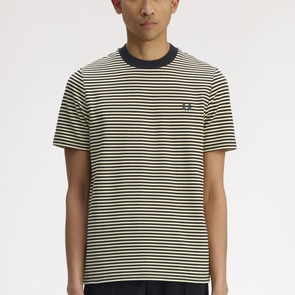 Man wearing Fred Perry men's Fine Stripe Retro T-Shirt in Black/Yellow