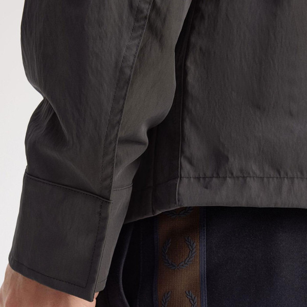Fred Perry Men's Zip Through Crinkle Nylon Overshirt in Anchor Grey close up on cuff