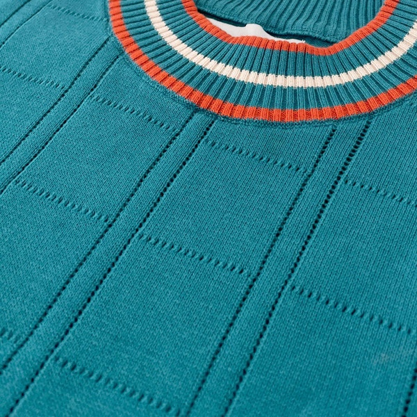 Madcap England Moore 60s Mod Pointelle Knit Mock Turtleneck Jumper in Gulf Coast close up on collar Madcap England Moore 60s Mod Pointelle Knit Mock Turtleneck Jumper in Gulf Coast close up on collar