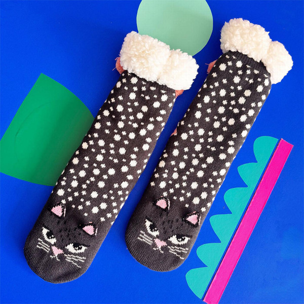 Feline Cat Face Cosy Retro Slipper Socks in Black by House of Disaster - Lifestyle Flat Lay From Front