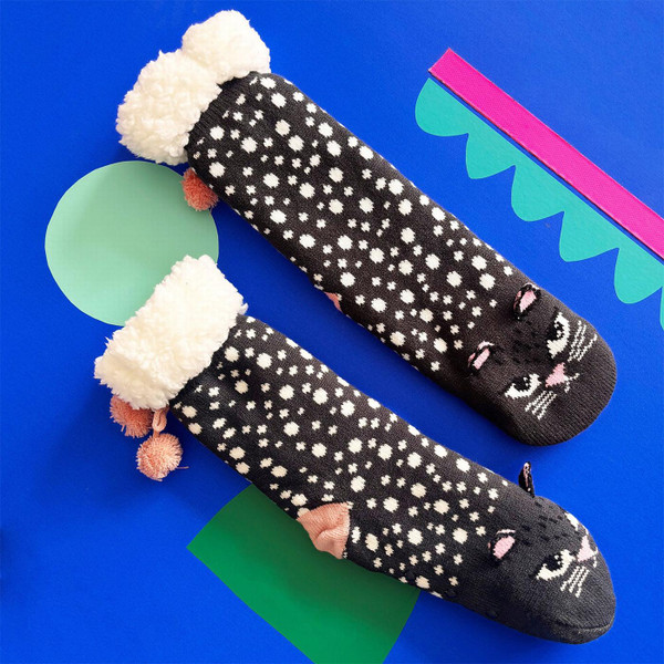 Feline Cat Face Cosy Retro Slipper Socks in Black by House of Disaster - Lifestyle Flat Lay From Side