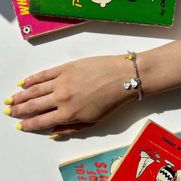 Peanuts Snoopy and Woodstock Retro Enamel Charm Bracelet by House of Disaster - Shown on Models Wrist
