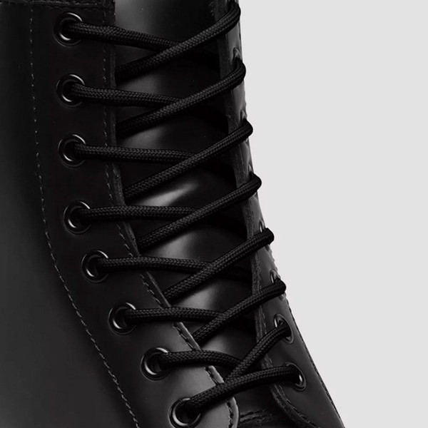 Photo of Dr Martens Black Laces threaded through boots