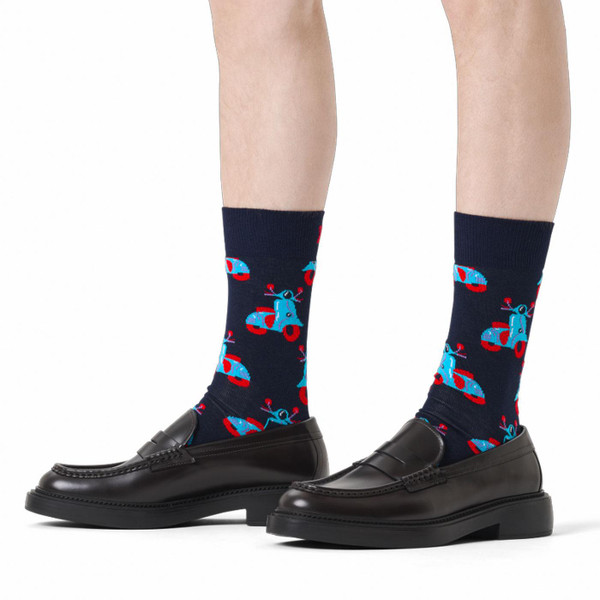 Man wearing Happy Socks Men's Mod Scooter Socks in Navy/Blue P004854