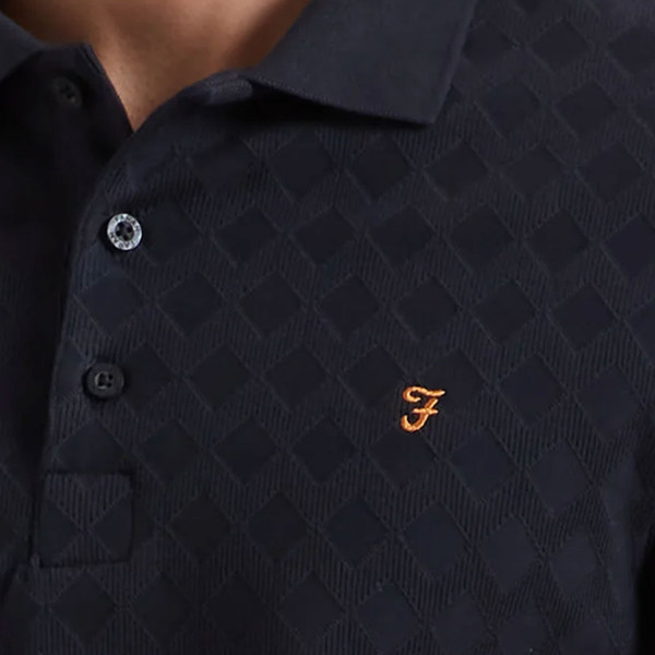Jaquard detail close up on Farah Vintage Mens Horace Diamond Jacquard Polo T-Shirt in Navy