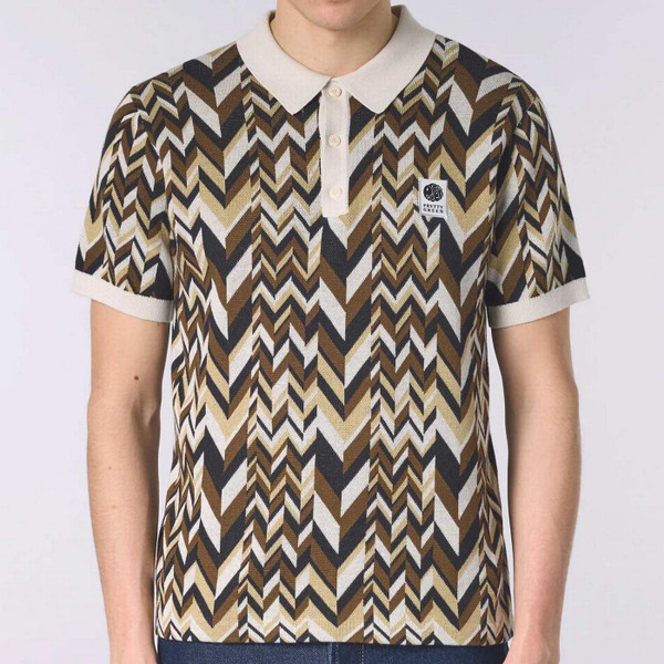 Model Wearing Pretty Green Starship 1960s Mod Op Art Chevron Knitted Polo Shirt in Stone Front