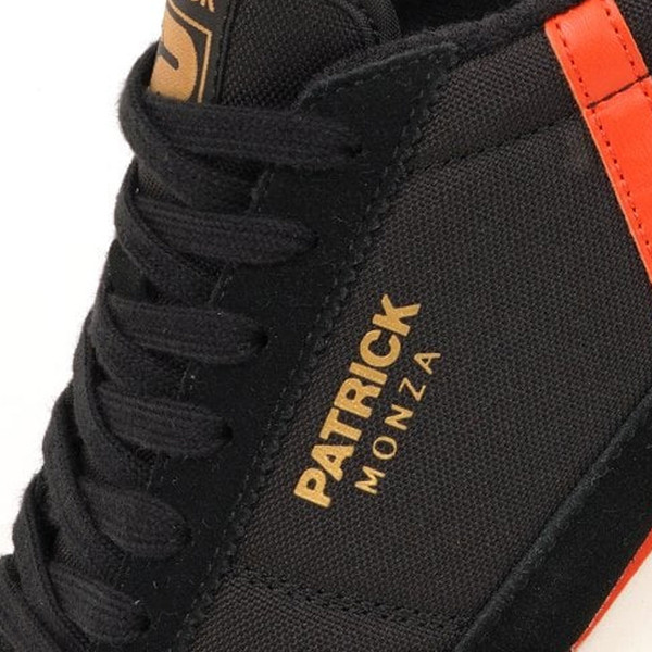 Branding and fabric on Patrick Monza Runner 80s Nylon Trainers in Black/Orange K9L00065