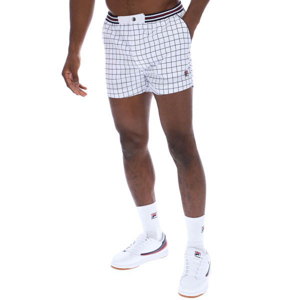 Man wearing Fila Vintage Men's 70s 80s High Tide Check Tennis Shorts in White