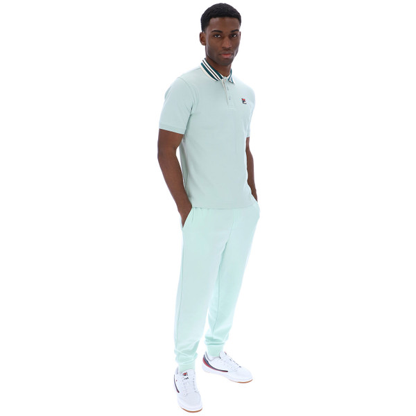 Man wearing Fila Vintage Giulio Mens Retro Track Pants in Surf Spray Green