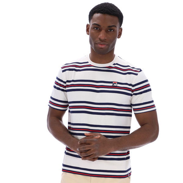Man wears Fila Vintage Cesare Retro 80s Striped T-Shirt in Gardenia White