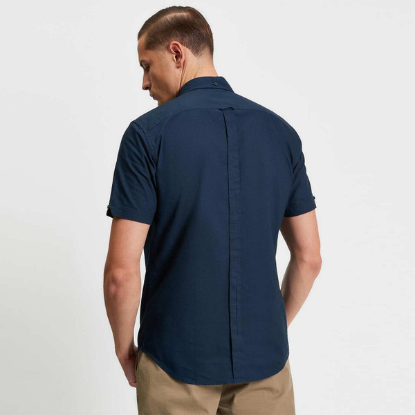 Model Wearing Ben Sherman Men's Mod Short Sleeve Button Down Oxford Shirt in Dark Navy - Back View
