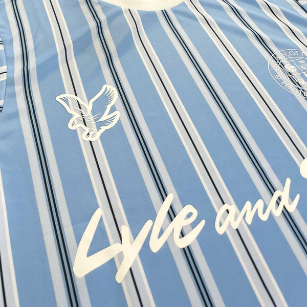 Lyle and Scott Men's Retro 1980s Stripe Football T-shirt in Chalk Blue Eagle Logo