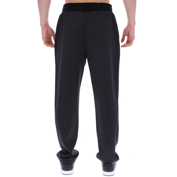 Back of Fila Gold Men's Edward Retro Herringbone Patten Track Pants in Black