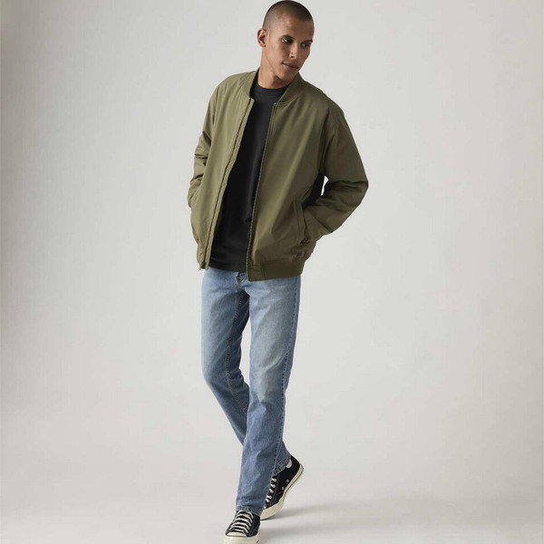 Model Wearing Levi's 511 Men's Retro Slim Denim Jeans in Waterfall Cool - Front View 2