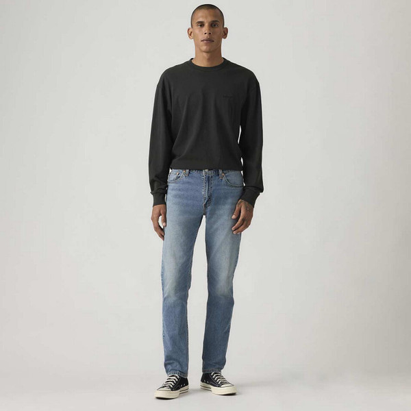 Model Wearing Levi's 511 Men's Retro Slim Denim Jeans in Waterfall Cool - Front View 1