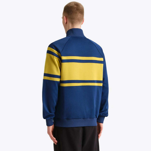 Model Wearing Diadora Jacket 80s Men's Retro Casuals Funnel Neck Track Top in Navy Peony - Back View