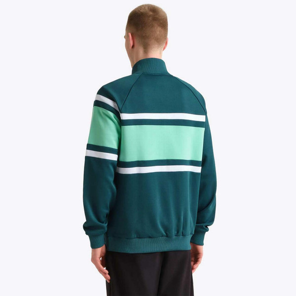 Model Wearing Diadora Jacket 80s Men's Retro Funnel Neck Colour Block Track Top in Spruce Green - Back View