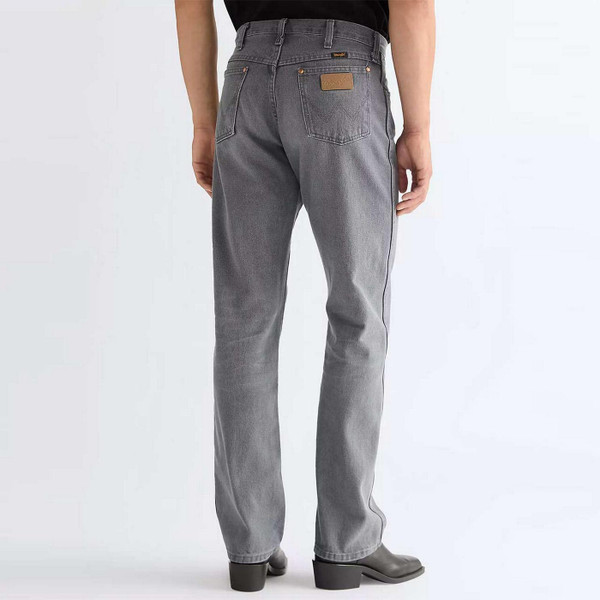 Model Wearing Wrangler 13MWZ Cowboy Cut Men's Retro Western Denim Jeans in Granite Tide - Back View