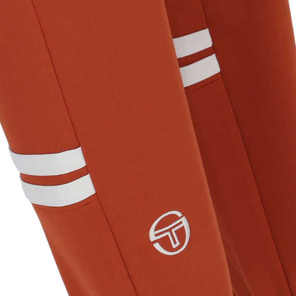 Sergio Tacchini logo detail on Sergio Tacchini Dallas Retro Track Pants in Rooibos Orange