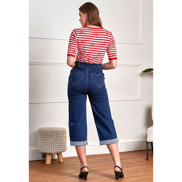 Back of woman wearing Banned Retro Womens Maddy Love Heart Pocket Capri Jeans in Blue