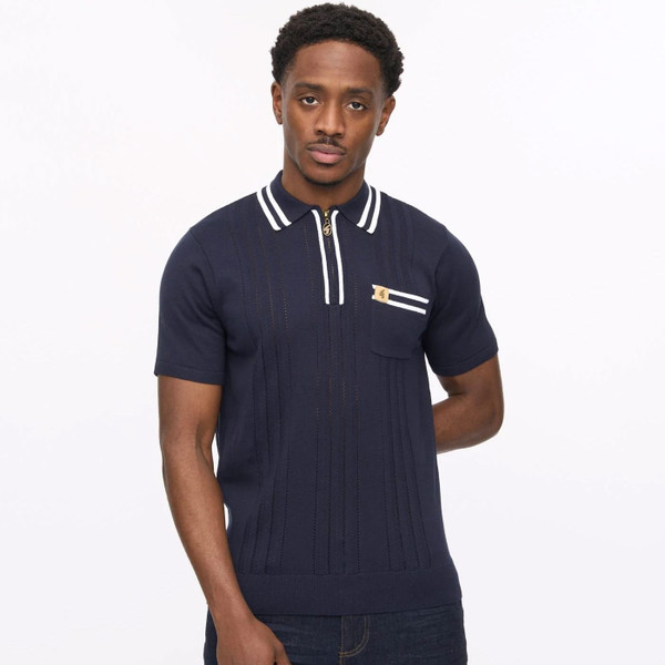 Man wearing Gabicci Vintage Johnson Men's Pointelle Knit Tipped Zip Neck Polo Shirt in Navy