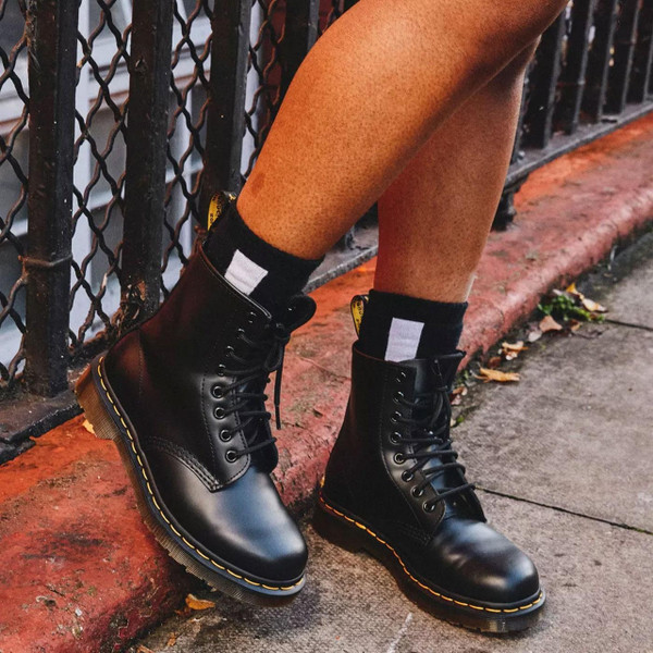 Person wearing Dr Martens Double Doc Socks in Black and White AC742003