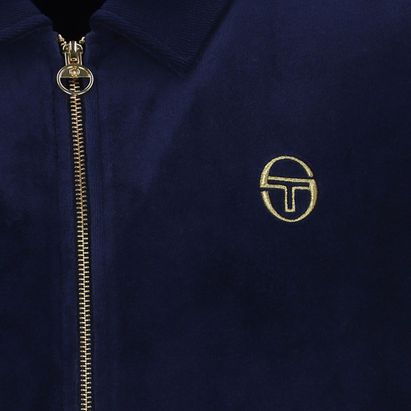 Collar and gold zip on Sergio Tacchini Monte Retro 80s Velour Track Jacket in Maritime Blue Navy