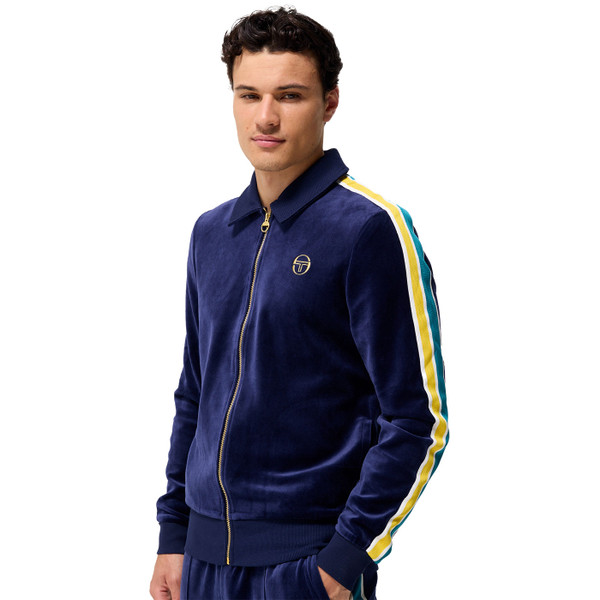 Man wearing Sergio Tacchini Monte Retro 80s Velour Track Jacket in Maritime Blue Navy