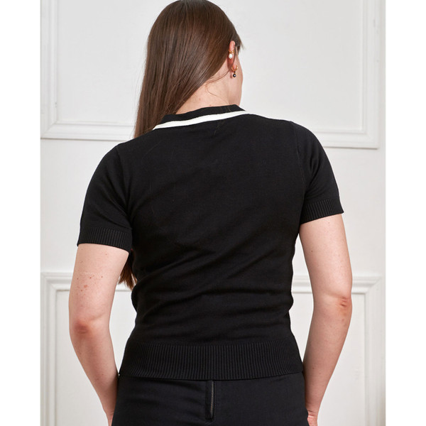 Back of woman wearing Banned Retro Women's Mila Ace Knitted Short Sleeve Jumper in Black