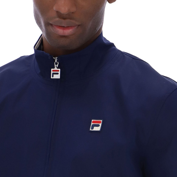 Collar zipper and F-Box logo on Fila Vintage Arturo Retro Mod Tipped Coach Jacket in Navy