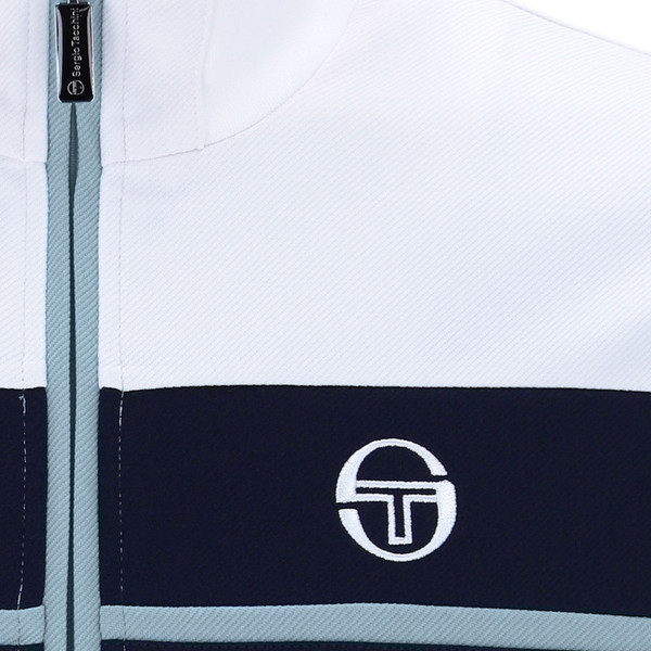 Chest logo on Sergio Tacchini Damarindo Retro 80s Casuals Track Top in Grey/White