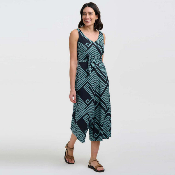 Model Wearing Sugarhill Brighton Lamiah Retro 70s Geometric Spirals and Diamonds Jumpsuit in Black and Green - Side View