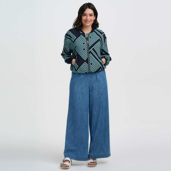 Model Wearing Sugarhill Bobbie Retro 80s Geometric Spirals and Diamonds Bomber Jacket in Black and Green - Front View