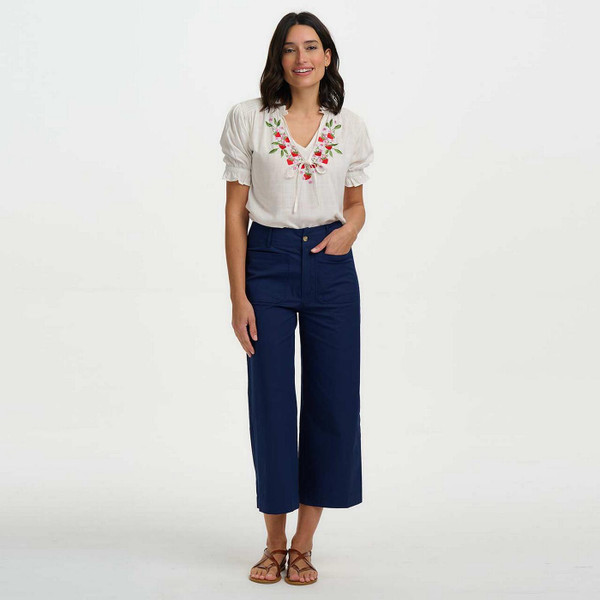 Model Wearing Sugarhill Brighton Angelique Retro 1970s Wild Strawberry Shirred Top in White - Front View