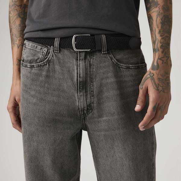 Model Wearing Levi's Austin men's Retro Stretch Woven belt in Caviar Black