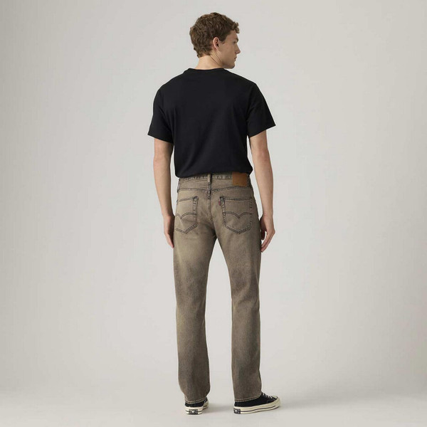 Model Wearing Levi's 501 Original Straight Denim Jeans in Ancient Space Overdye Brown - Back View